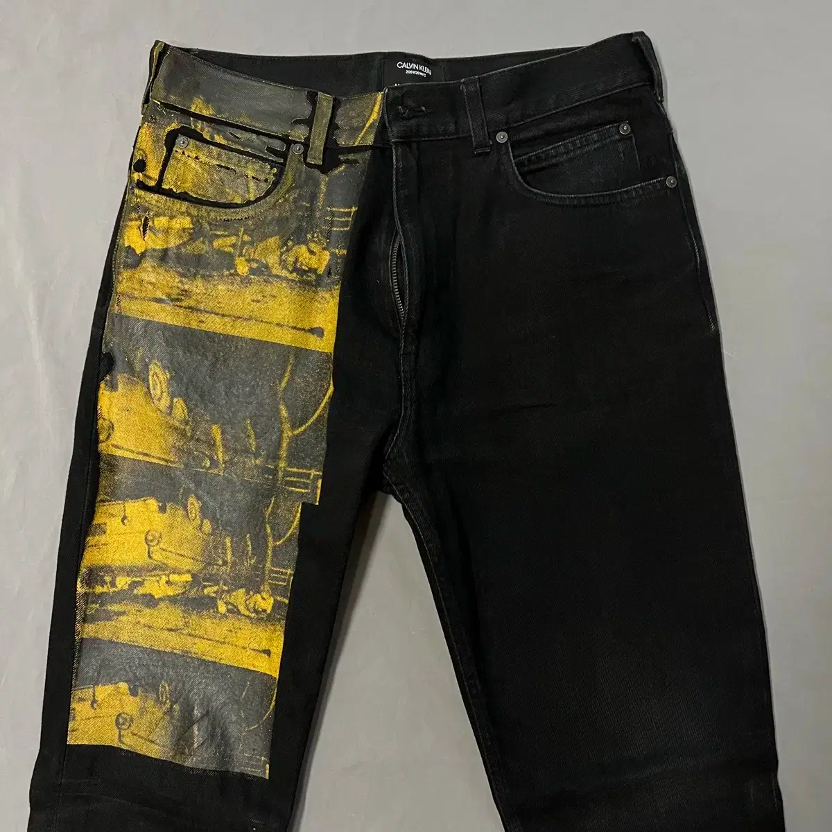 캘빈클라인 205W39NYC 라프시몬스 앤디워홀 페인트 데님 팬츠