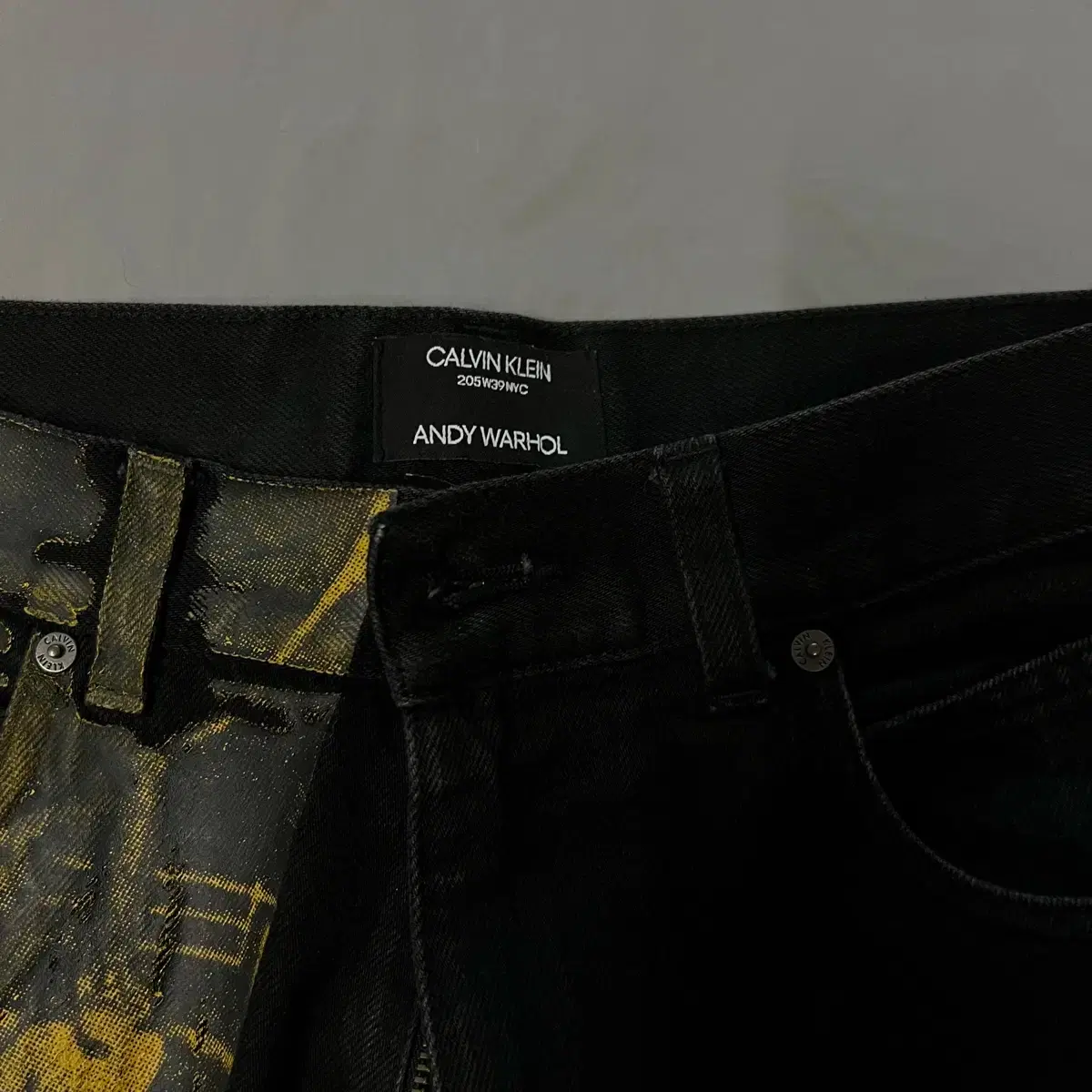 캘빈클라인 205W39NYC 라프시몬스 앤디워홀 페인트 데님 팬츠