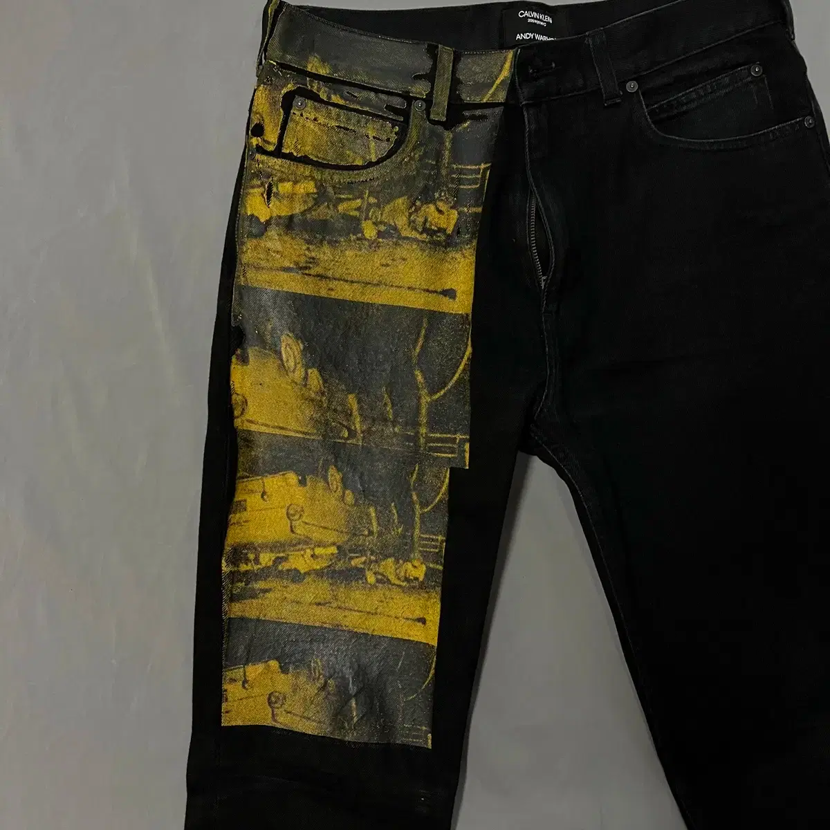 캘빈클라인 205W39NYC 라프시몬스 앤디워홀 페인트 데님 팬츠