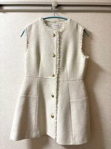 내추럴 뷰티 베이직 아이보리 슬리브리스 베스트 프린지 가공