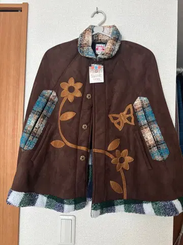 새상품 티티카카 브라운 판초