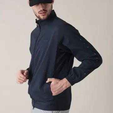 TRAVISMATHEW 트라비스 마슈 스탠드 카라 플레저 재킷 블랙