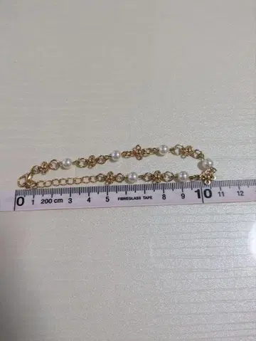 골드 컬러 펄 장식 팔찌