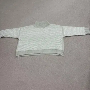 아이보리 아크릴 울 스웨터