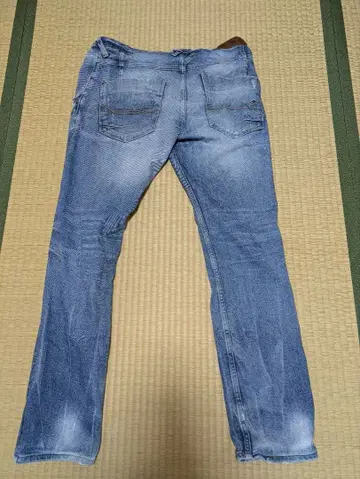 타미힐피거 데미지 가공 라이트 블루 데님 팬츠