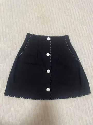 Tnewties (투엔티즈) 스커트