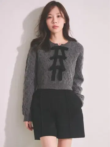 CELFORD 리본 모티브 케이블 니트 풀오버