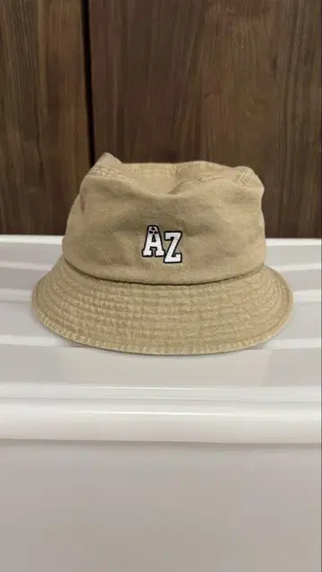 핑 골프 베이지 네이티브 버킷햇 AZ 로고 포함