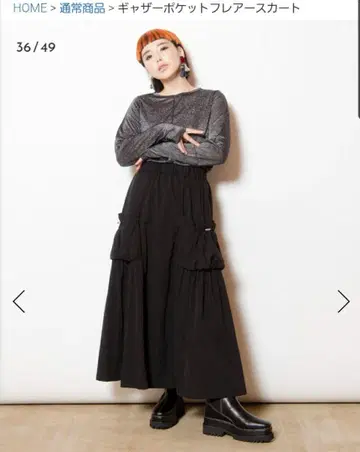 오즈모시스 개더 포켓 플레어 스커트 블랙