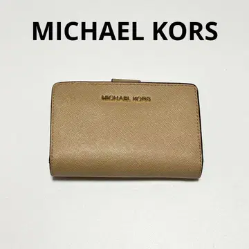 마이클코어스 3단 폴더형 지갑 베이지 계열 골드 금장 장식 컴팩트 지갑