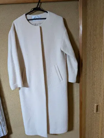 내추럴 뷰티 베이직 화이트 노카라 롱 코트