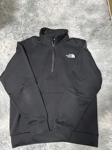 THE NORTH FACE 블랙 하프 지퍼 저지