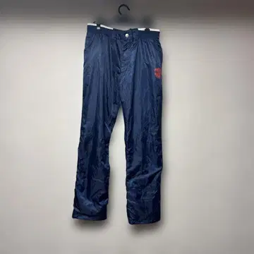 FILA 네이비 골프 나일론 팬츠 휠라