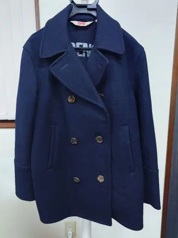 GOODENOUGH 네이비 더블 브레스트 피 코트