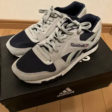 리복 GL 6000 그레이/네이비 스니커즈
