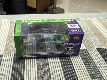 MINI GT AAPE EVA Racing GTR R35 Pop Race