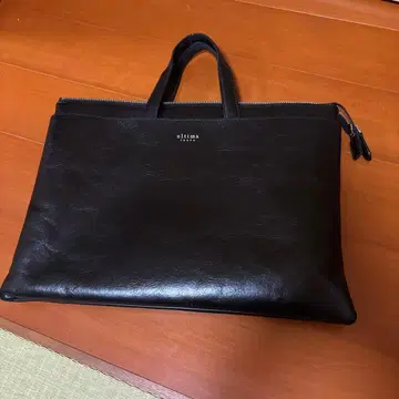ultima tokyo 블랙 가죽 핸드백