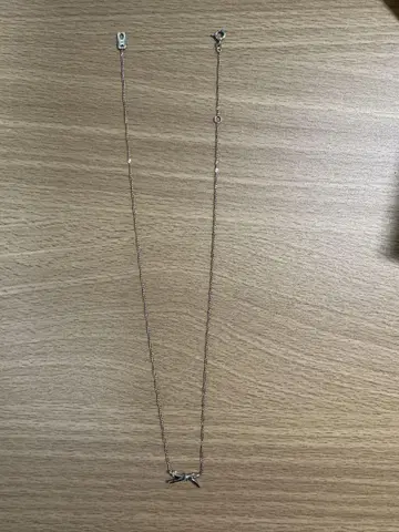 ete 실버 리본 모티브 목걸이