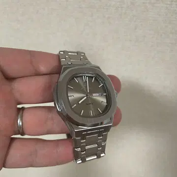 pelvini poedagar 노틸러스풍 손목시계 쿼츠