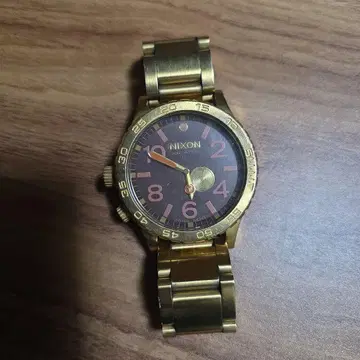NIXON 골드 손목시계