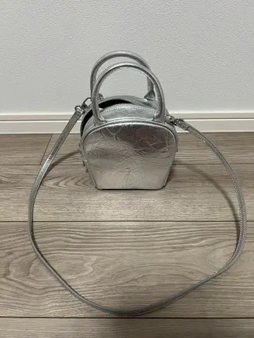 말루 유나이티드 애로우즈 가죽 미니 라운드 보스턴 백