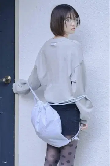 smyeon Wing motif knapsack