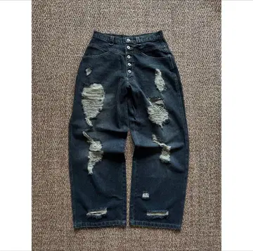 Distressed washed wide denim pants