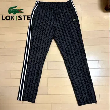 LACOSTE 사이드 테이핑 모노그램 자카드 트랙 팬츠