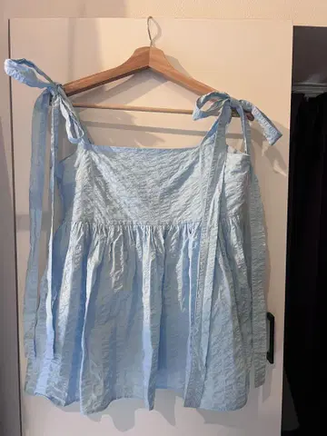 BLUE PALANG 스카이블루 슬리브리스 블라우스