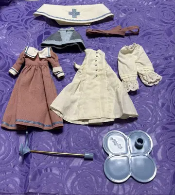 앙제리카 너스 오브 컴패션 아웃핏 일부