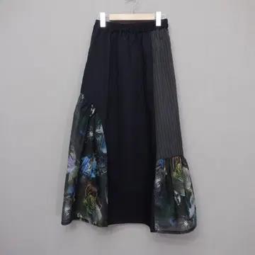 이즈스칼라 553231: 아트 꽃무늬 이소재 절개 스커트