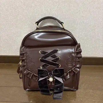 리본 포함 브라운 백팩