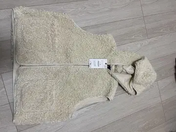 후드 부착 보아 베스트 크림색
