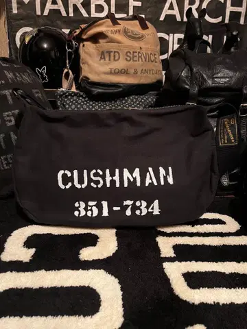 CUSHMAN 쿠시맨 40's 바디백 뉴스 페이퍼 백
