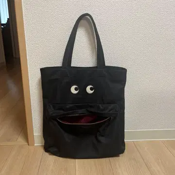 ANYA HINDMARCH 블랙 토트백 얼굴 디자인