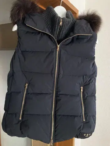 TATRAS 다운 베스트 퍼