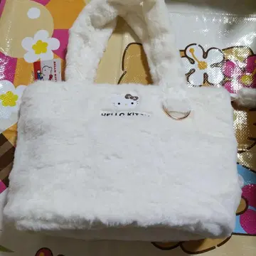 아베일 헬로키티 에코 퍼 백 화이트 표범 무늬 리본 키티