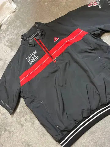 르꼬끄 스포르티브 방한 충전솜 반팔 자켓 블랙/레드 XL