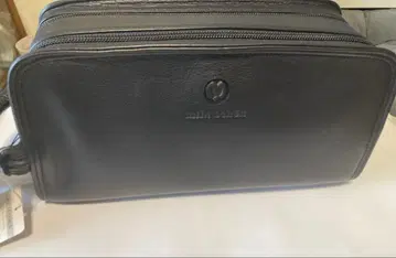 밀라 쇤 블랙 가죽 클러치백