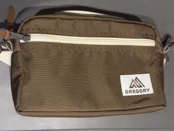 GREGORY 패디드 숄더 파우치 M 브라운