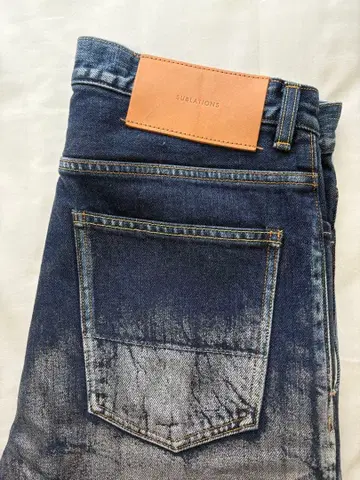 SUBLATIONS 2TUCK WIDE DENIM PANTS