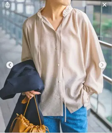 스픽앤스팬 하이브리드 프릴 블라우스