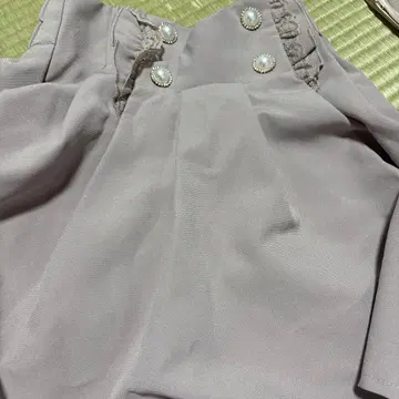 연한 핑크 펄 버튼 미니 스커트 ROJITA