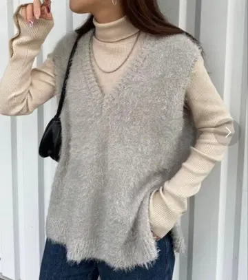 DISCOAT 라메 페더 얀 베스트