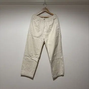 STILL BY HAND 원턱 테이퍼드 팬츠