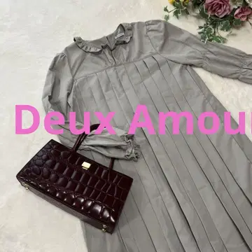 새상품급 Deux Amour 듀자무르 케이블 절개 턱 소매 상의