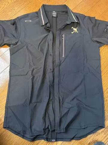 Oakley 블랙 골프 셔츠 포켓 부착