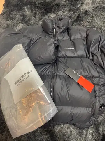 thisisneverthat 블랙 다운 자켓