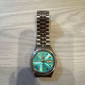 ORIENT 오리엔트 쓰리스타 EM4J-CO 손목시계