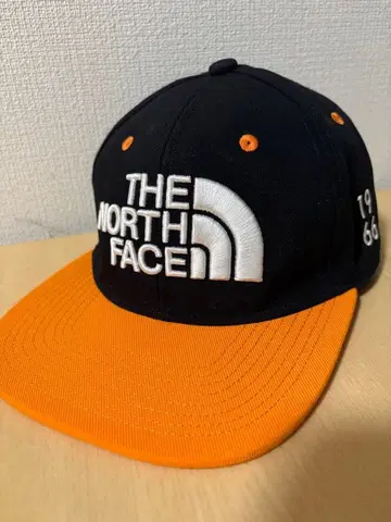 THE NORTH FACE 캡 블랙/오렌지 1966